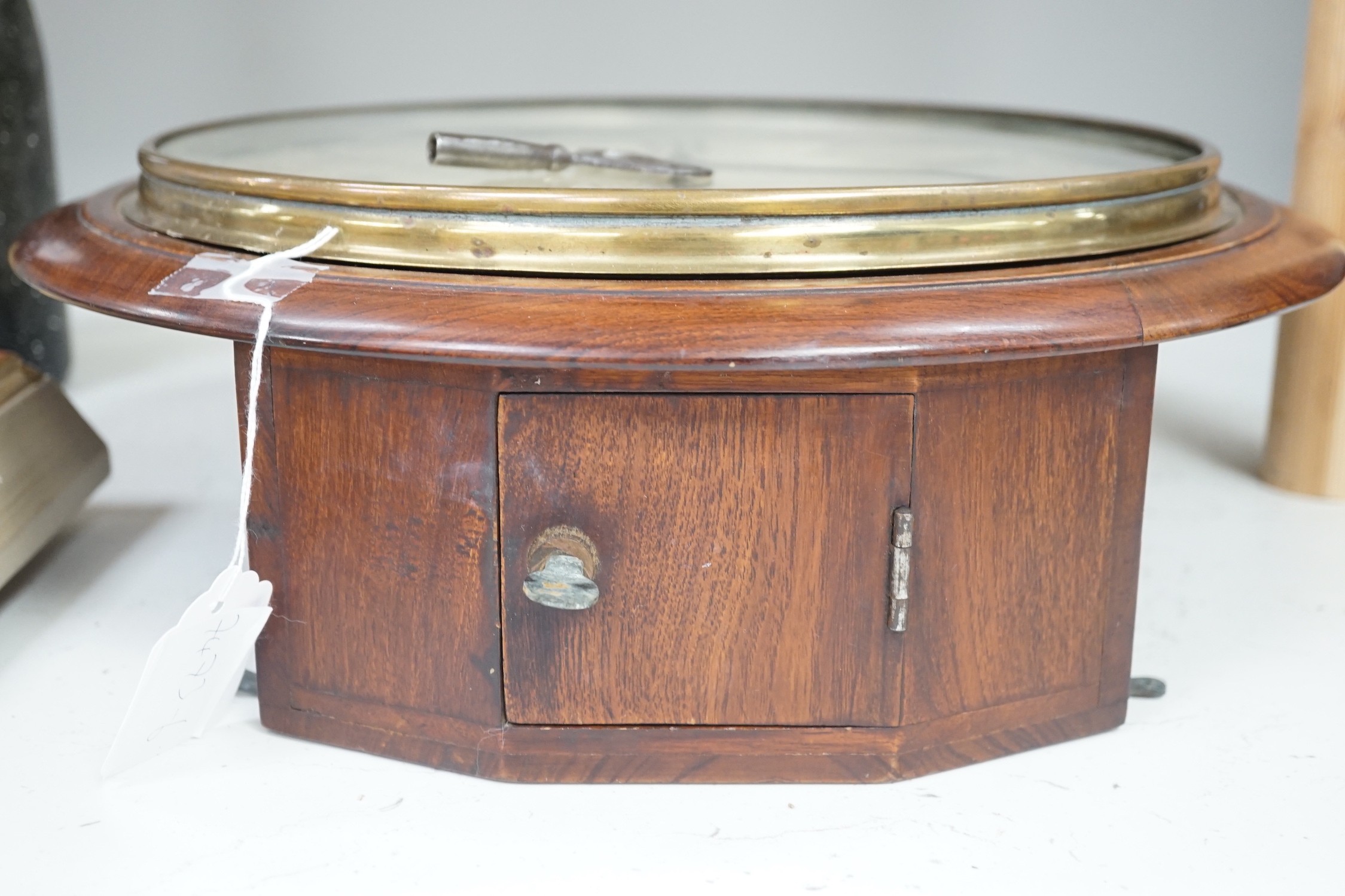A teak cased wall clock, 38cms diameter